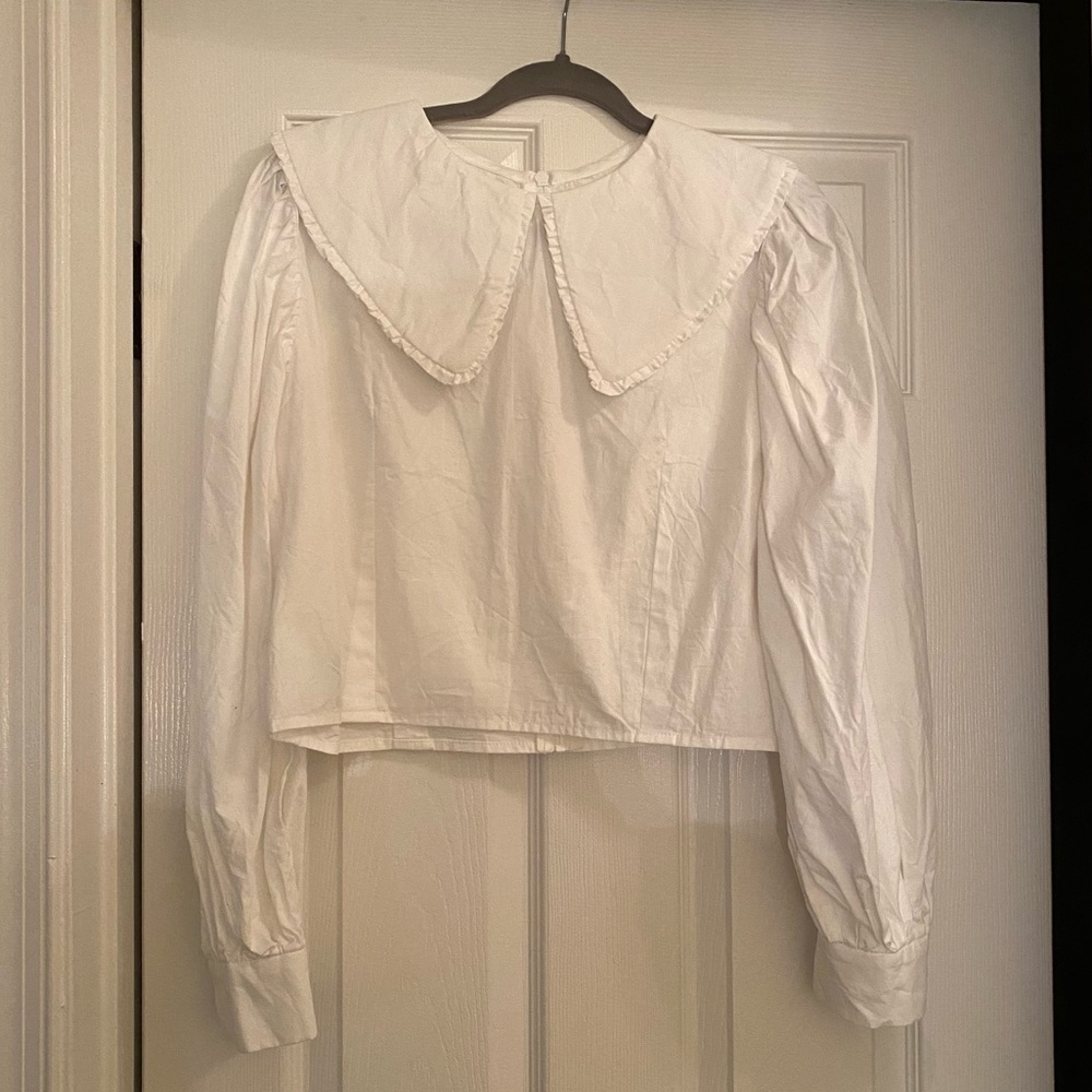 By Megan Crosby white voluminous sleeve blouse with large collar